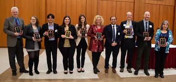 Recipients of awards in the first Best in Business Awards Ceremony include (left to right), with Dean Kaustav Misra: Armand Petri, Sage Brandt, Aaron Mendez, Sarah State, Jenna Leid, Dr. Lisa Walters, Dean Misra, George Simmons, Jason Becker and Dr. Reneta Barneva. (Missing from photo are Stuart Shapiro, Robyn Reger and a representative from partner Fastenal.)